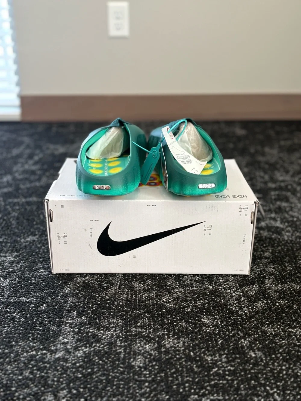 Nike Teal Green Slide Sandals with Silver Swoosh